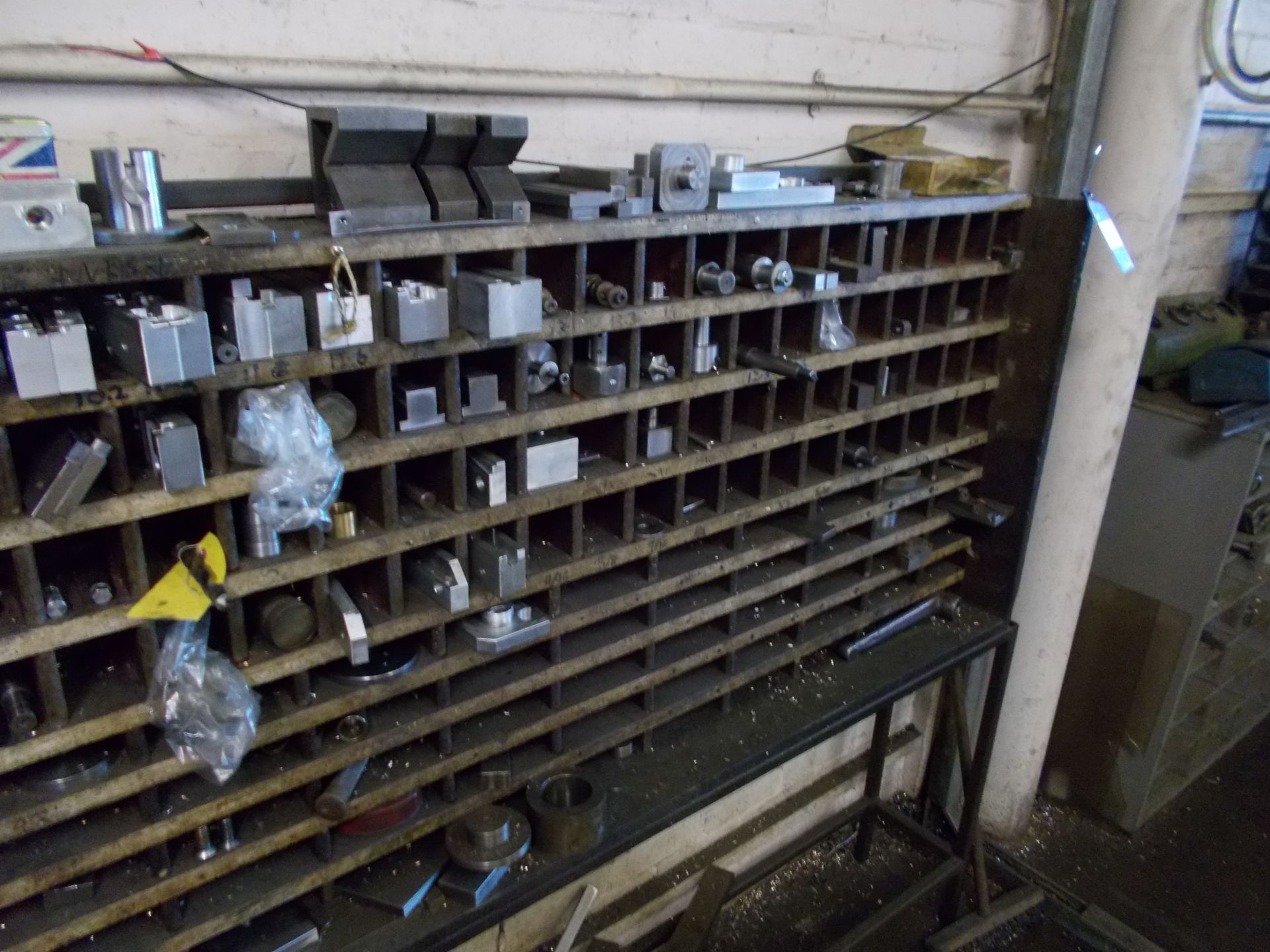 Pigeon hole rack including various machine tooling, for example angle plates, V-blocks etc - Image 3 of 3