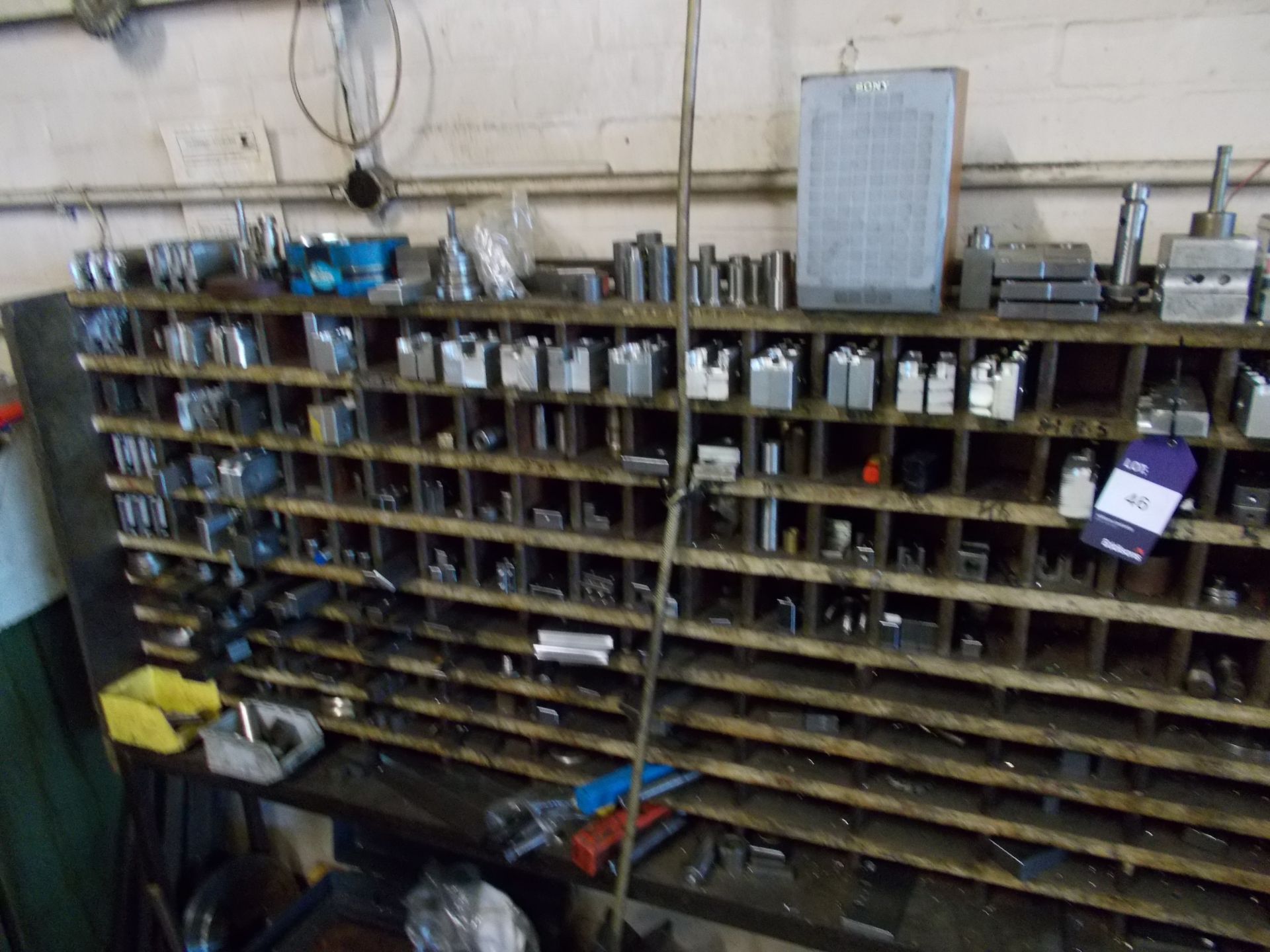 Pigeon hole rack including various machine tooling, for example angle plates, V-blocks etc - Image 2 of 3