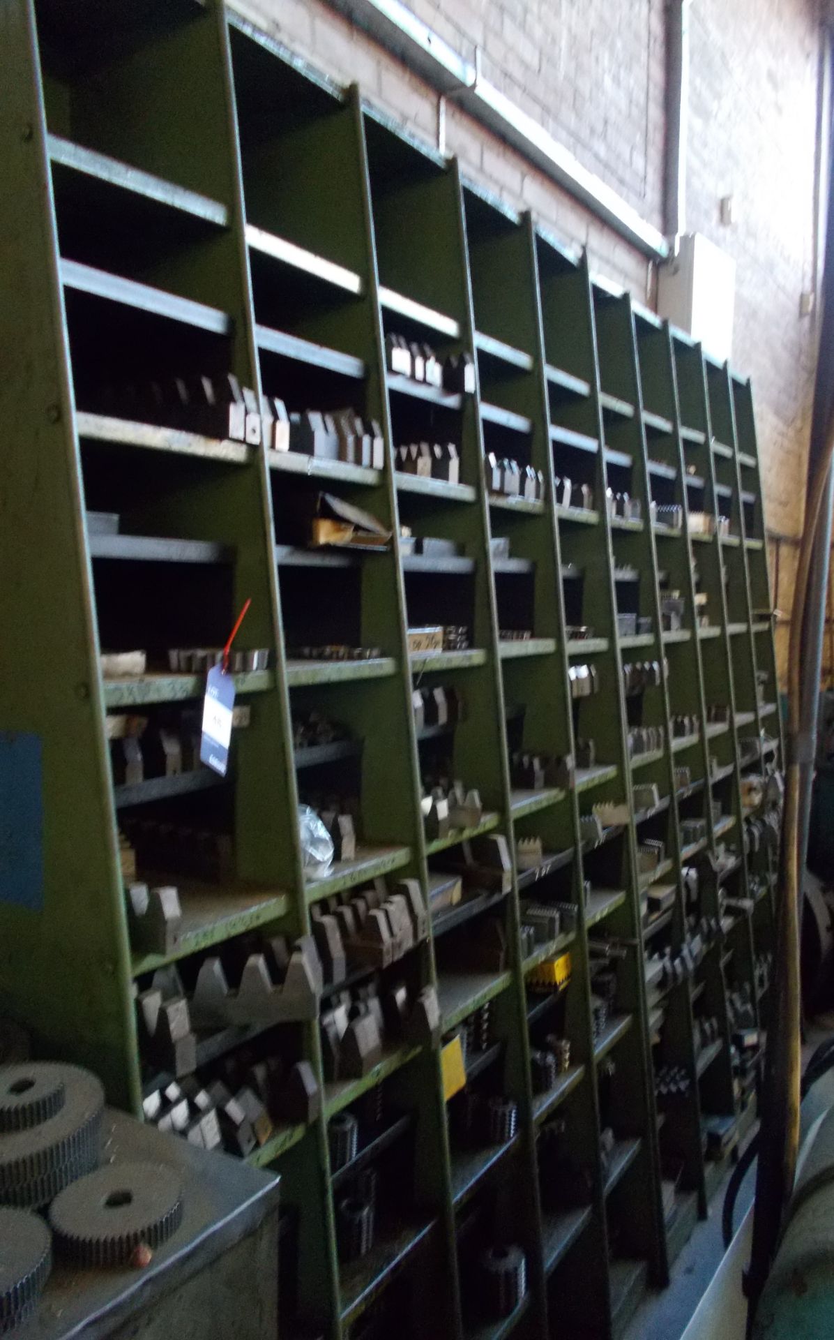 Pigeon hole rack and contents including various gear shaper and planer tooling