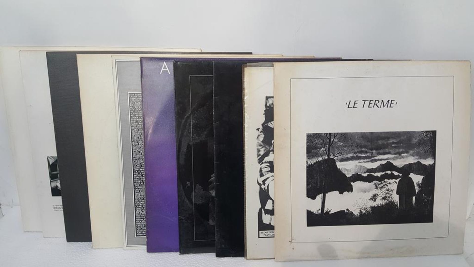 Eleven various Joy Division Albums