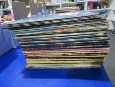 A Mixed Selection of over 55 Vinyl Records