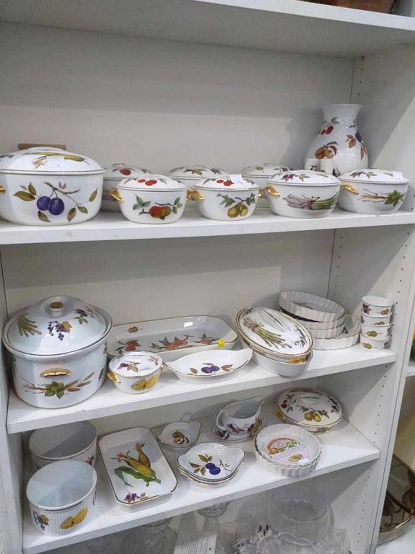 Three Shelves of Mainly Royal Worcester 'Evesham'