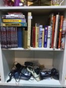 A Shelf of Books & DVDs