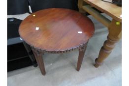 A Circular Wooden Table