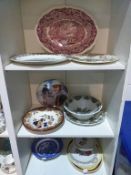 Three Shelves of Assorted Plates