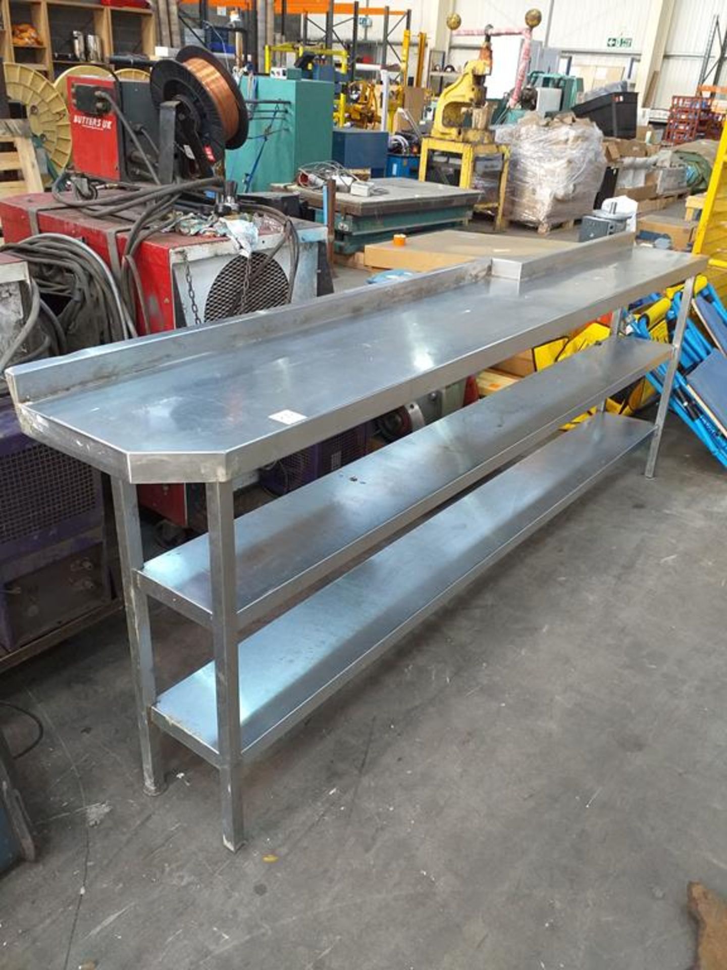 A Thin S/Steel Prep Table with Splash Back and Undertier
