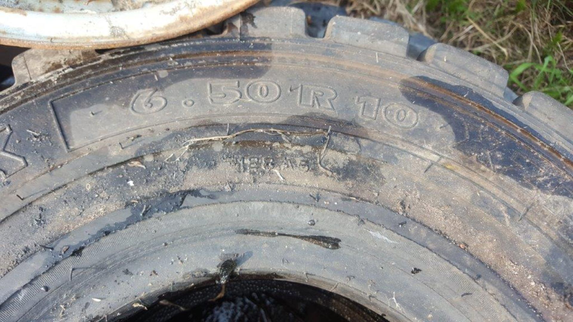 lot of mixed forklift tries car rims spare tire - Image 2 of 3