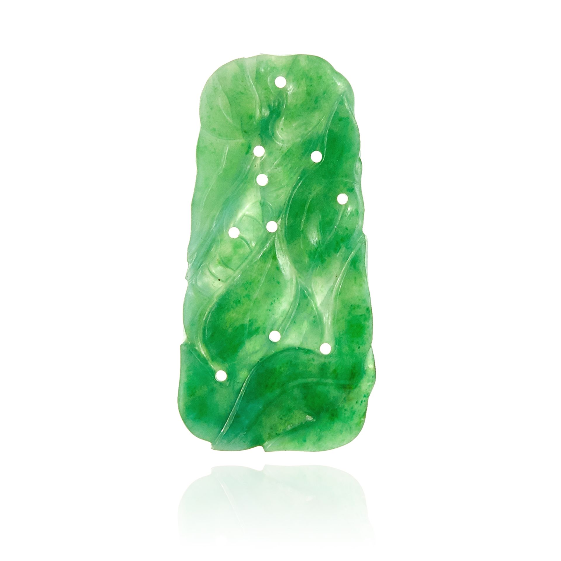 A CHINESE JADEITE JADE PLAQUE PENDANT the tapering jade plaque carved with floral motifs, 3.8cm, 5.