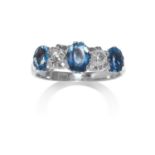 AN AQUAMARINE AND DIAMOND RING in white gold or platinum, set with a row of five alternating