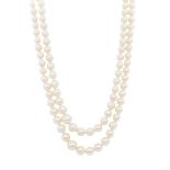 A TWO ROW PEARL AND DIAMOND NECKLACE in platinum or white gold, comprising two rows of one hundred