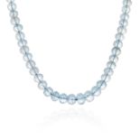 AN AQUAMARINE BEAD NECKLACE in yellow gold, comprising a single row of fifty three faceted