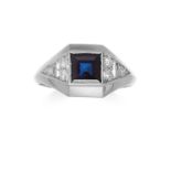 A SAPPHIRE AND DIAMOND DRESS RING in white gold or platinum, set with a central sapphire in
