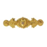 AN ANTIQUE DIAMOND SWEETHEART BROOCH CIRCA 1890 in 15ct yellow gold, set at the centre with a rose