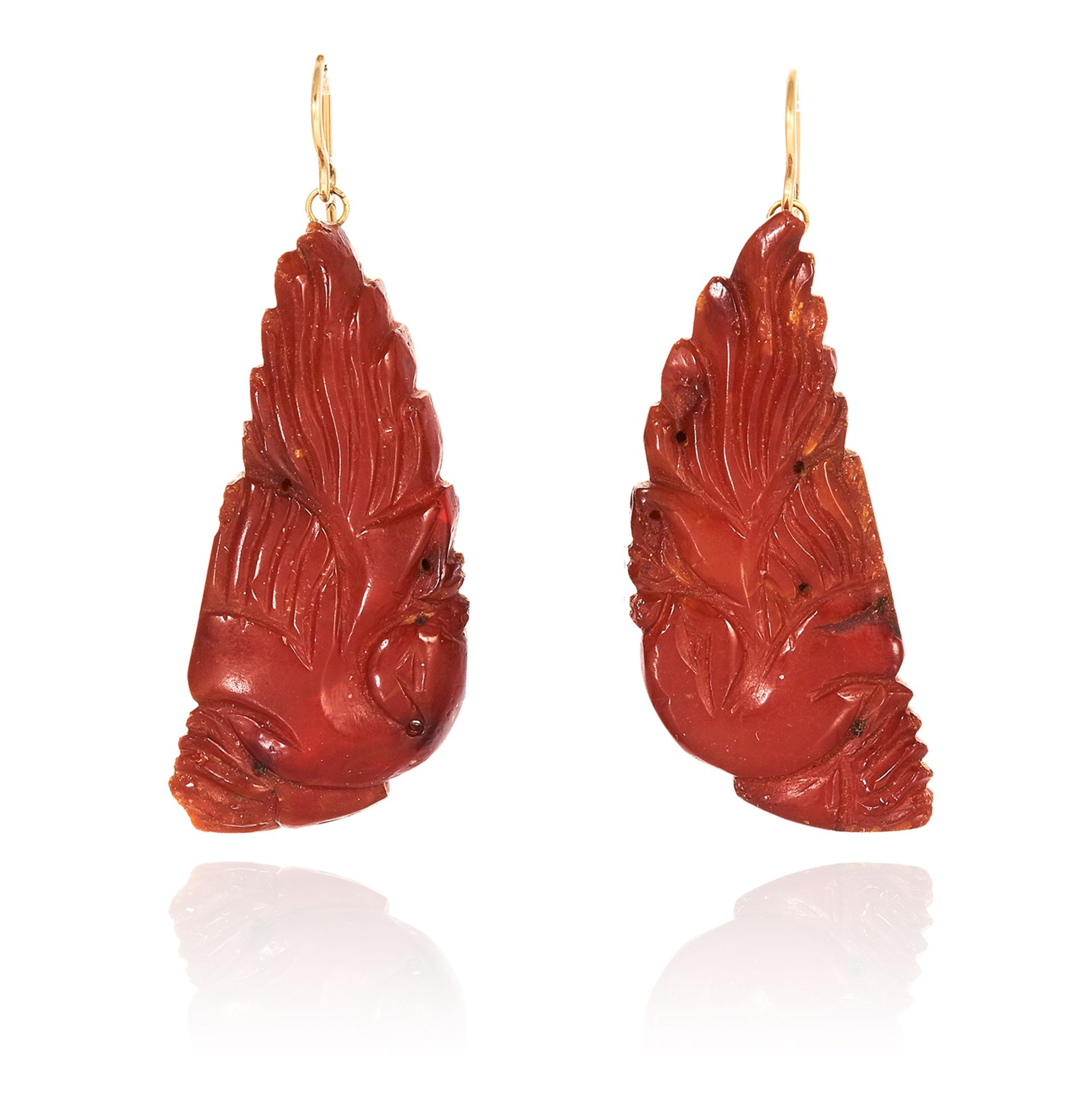 A PAIR OF ANTIQUE CHINESE AMBER EARRINGS, MING DYNSATY suspended from hooks, 17th Century, 5.7cm,