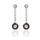 A PAIR OF ART DECO DIAMOND AND ENAMEL EARRINGS in platinum, each set with an old cut diamond