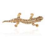 AN ANTIQUE DIAMOND, RUBY AND PEARL LIZART BROOCH in high carat yellow gold, in the form of a lizart,