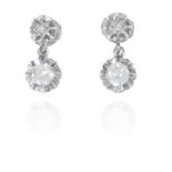 A PAIR OF ANTIQUE DIAMOND EARRINGS in platinum or white gold, each set with an old cut diamond of