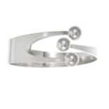 A VINTAGE SCANDINAVIAN JESTER BANGLE AND RING SUITE, ANA GRETA EKER in sterling silver, comprising a