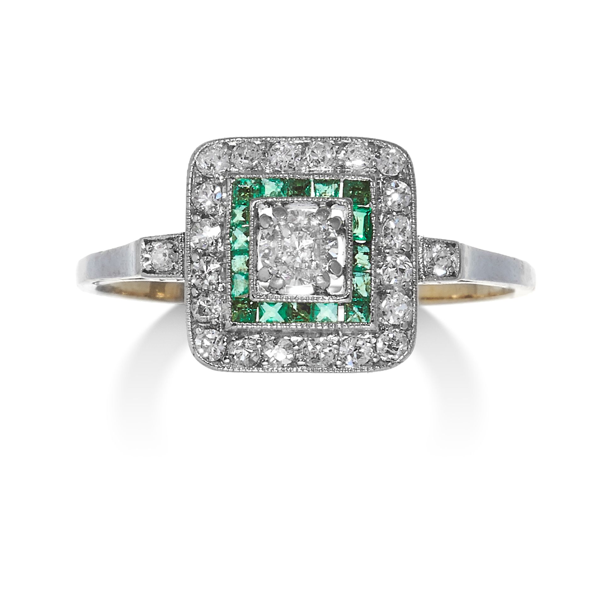 AN ART DECO DIAMOND AND EMERALD RING in high carat yellow gold and platinum, the old cut diamond