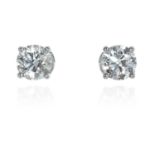 A PAIR OF 2.10 CARAT DIAMOND STUD EARRINGS in 18ct white gold, each set with a round brilliant cut