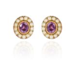 A PAIR OF ANTIQUE AMETHYST AND PEARL STUD EARRINGS, CIRCA 1830 in high carat yellow gold, each set