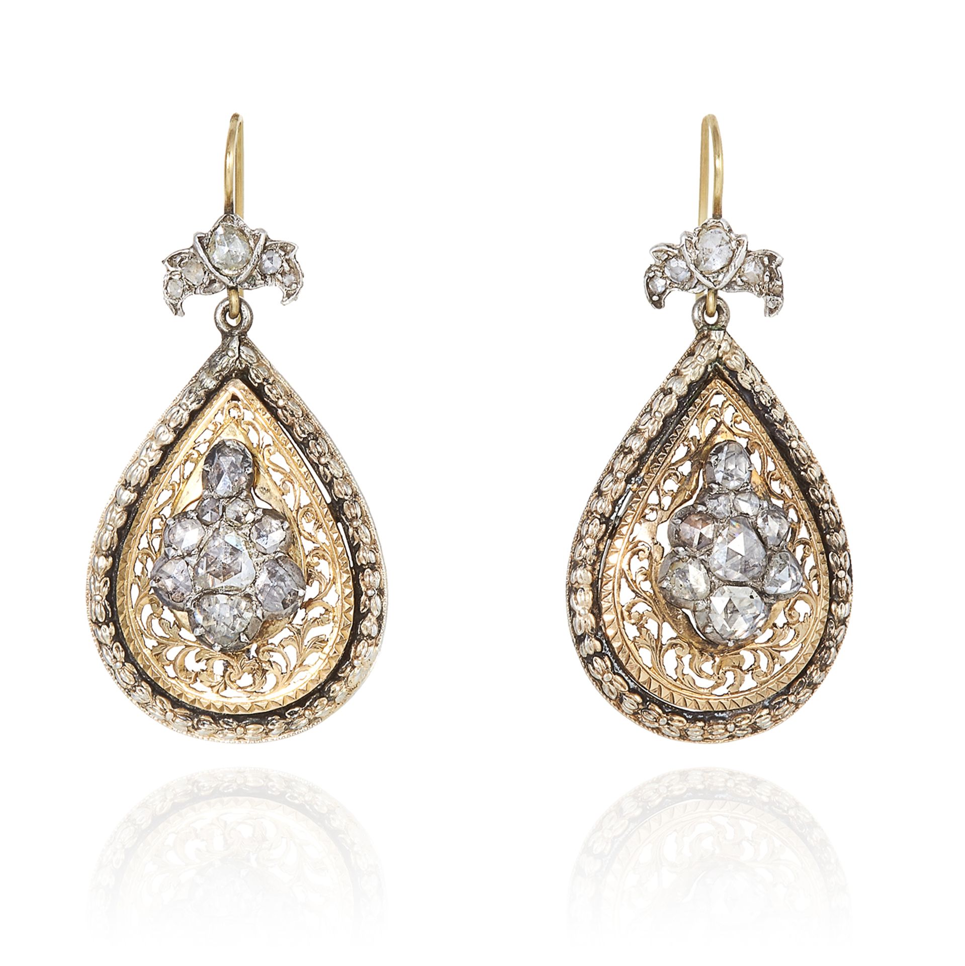 A PAIR OF DIAMOND EARRINGS in high carat yellow gold and silver, each set with a cluster of rose cut