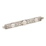 AN ANTIQUE NATURAL SALTWATER PEARL AND DIAMOND BAR BROOCH in platinum or white gold, set with a trio