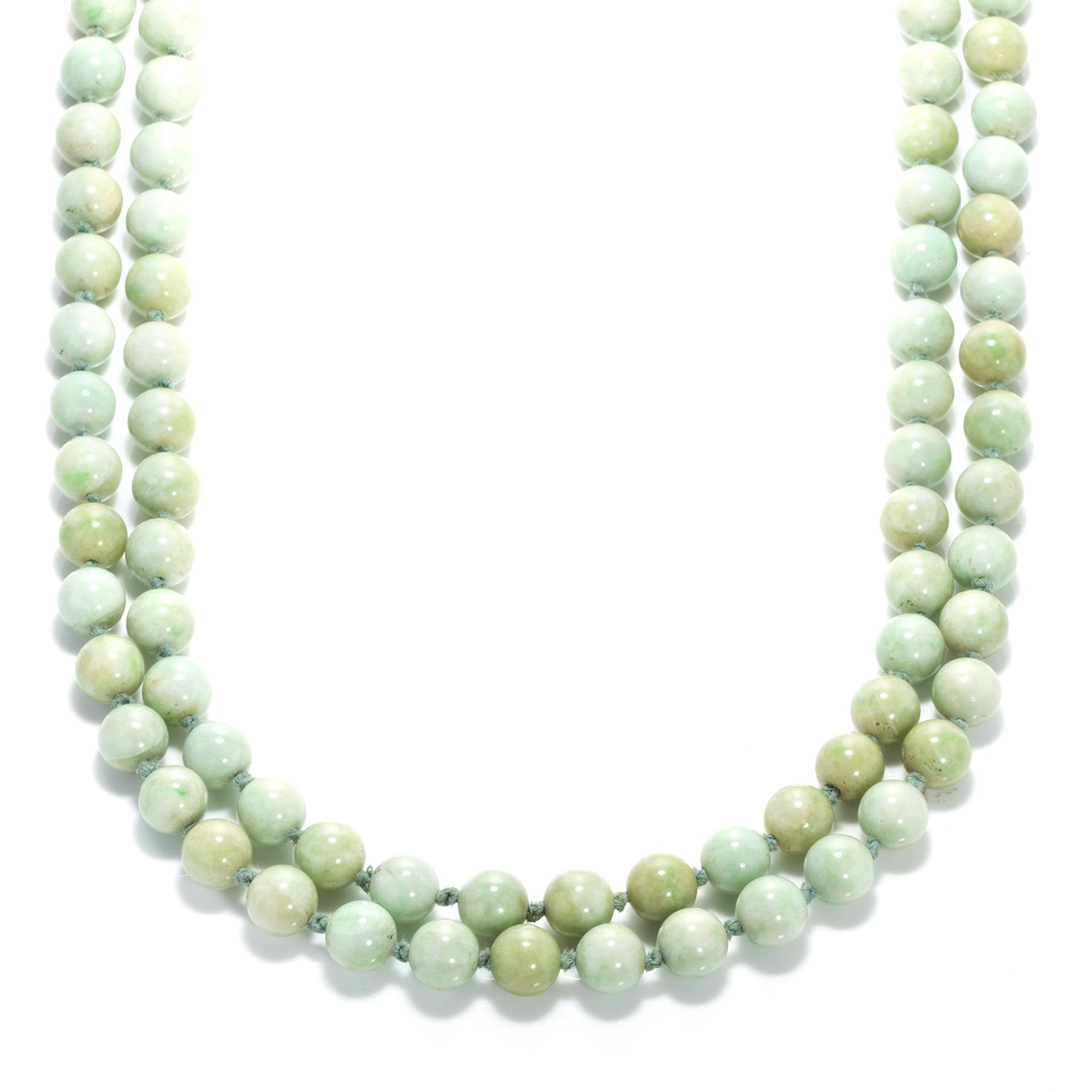 A JADEITE JADE BEAD NECKLACE comprising a single row of one hundred and three polished round jade