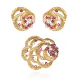 A VINTAGE RUBY AND DIAMOND BROOCH AND EARRINGS SUITE, KUTCHINSKY 1961 in 18ct yellow gold, formed of