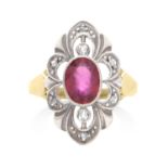 AN ANTIQUE RUBY AND DIAMOND RING in yellow gold and silver, the oval cut ruby of 1.50 carats