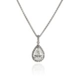 A 1.30 CARAT DIAMOND PENDANT in 18ct white gold, set with a pear cut diamond of approximately 1.10