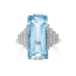 AN AQUAMARINE AND DIAMOND RING in 18ct white gold, the elongated aquamarine of 11.75 carats