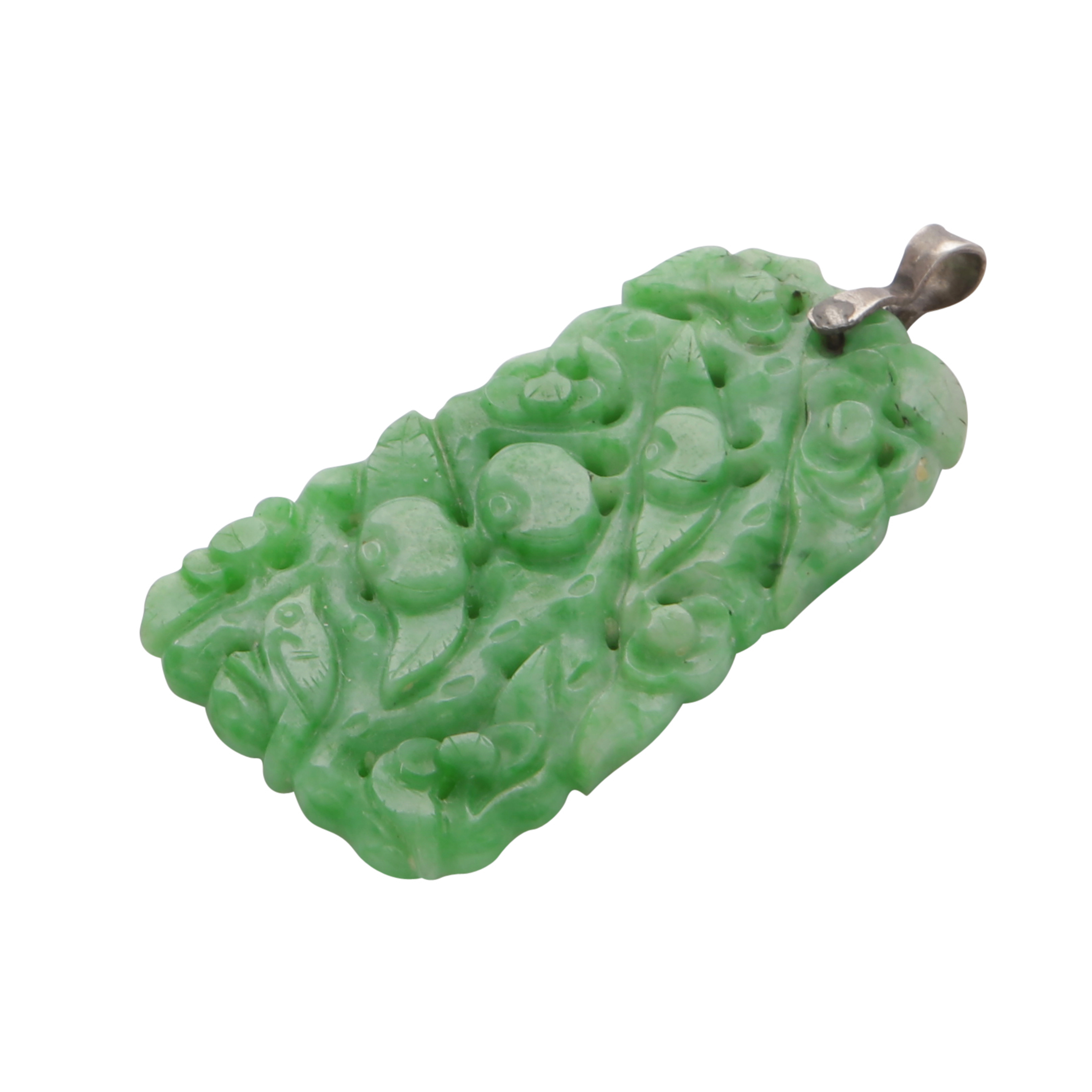 AN ANTIQUE JADEITE JADE PENDANT, CIRCA 1900 the tapering piece of jade carved in detail to depict