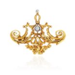 AN ANTIQUE ART NOUVEAU DIAMOND BROOCH in yellow gold and silver or platinum, foliate design,