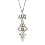 AN ANTIQUE DIAMOND AND PEARL PENDANT in white gold or silver, the floral and bow motif jewelled with