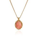 A CORAL PENDANT in 18ct yellow gold, the oval coral cabochon of 14.5mm within a ropetwist border,