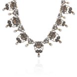 AN ANTIQUE FANCY LINK NECKLACE formed of graduated cash links depicting masks with garlands and