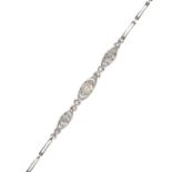 AN ANTIQUE ART DECO PEARL AND DIAMOND BRACELET in yellow gold and platinum, with a trio of