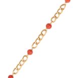 A CORAL FANCY LINK BRACELET in high carat yellow gold, the curb link bracelet punctuated with four