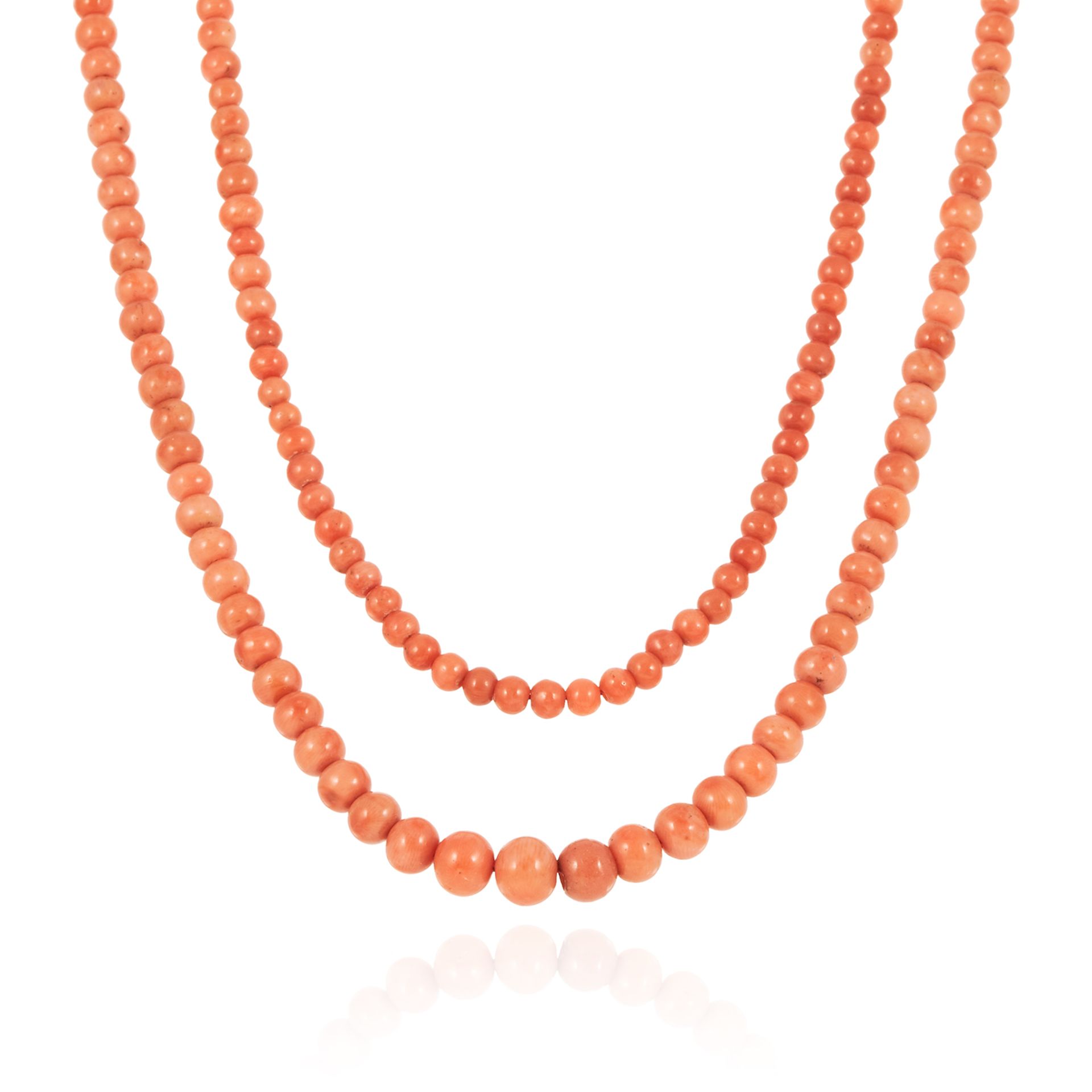 A LONG CORAL BEAD NECKLACE comprising a single row of three hundred and forty nine polished coral