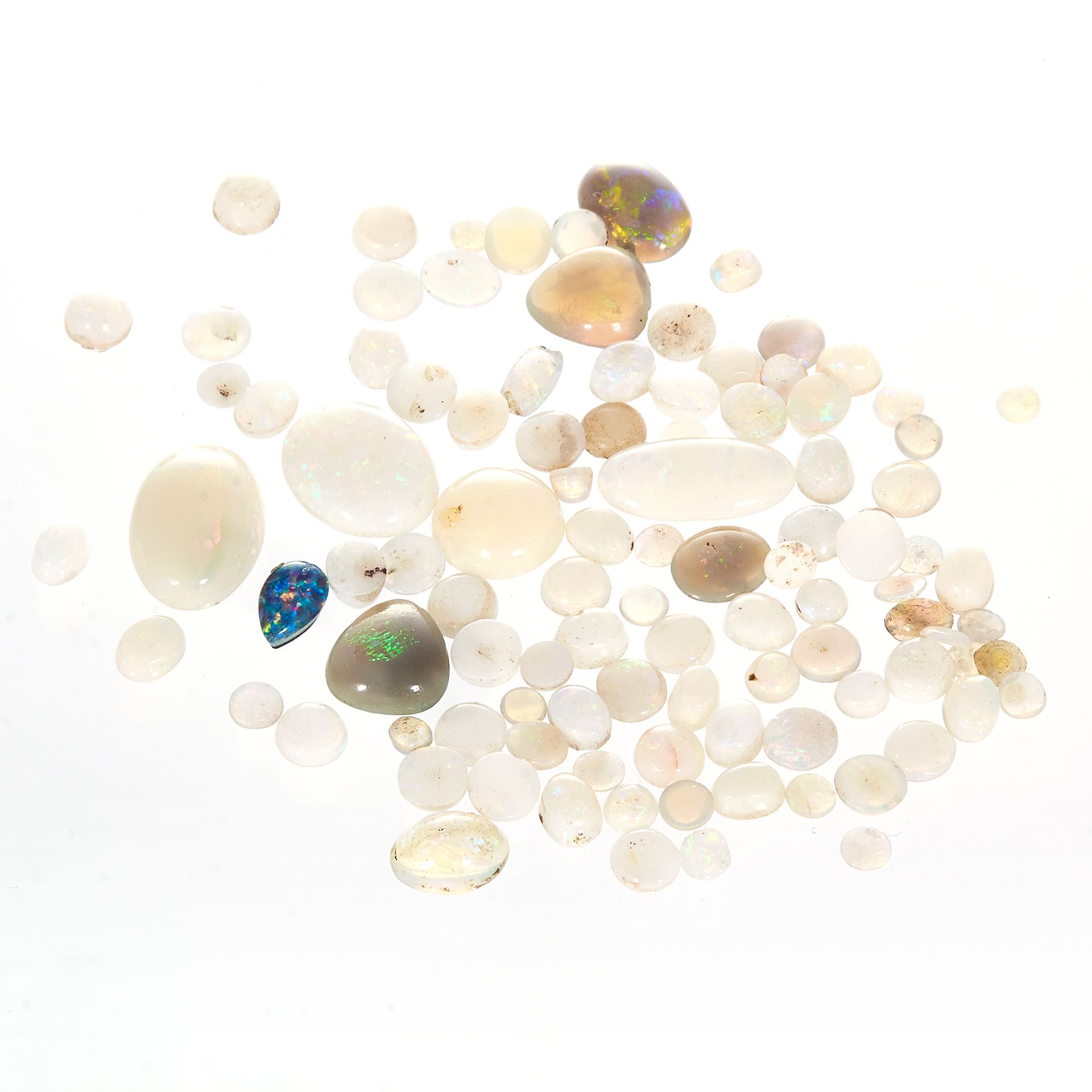 A 22 CARAT PARCEL OF OPALS variously sized up to 1.90 carats, mostly round and oval cabochons,