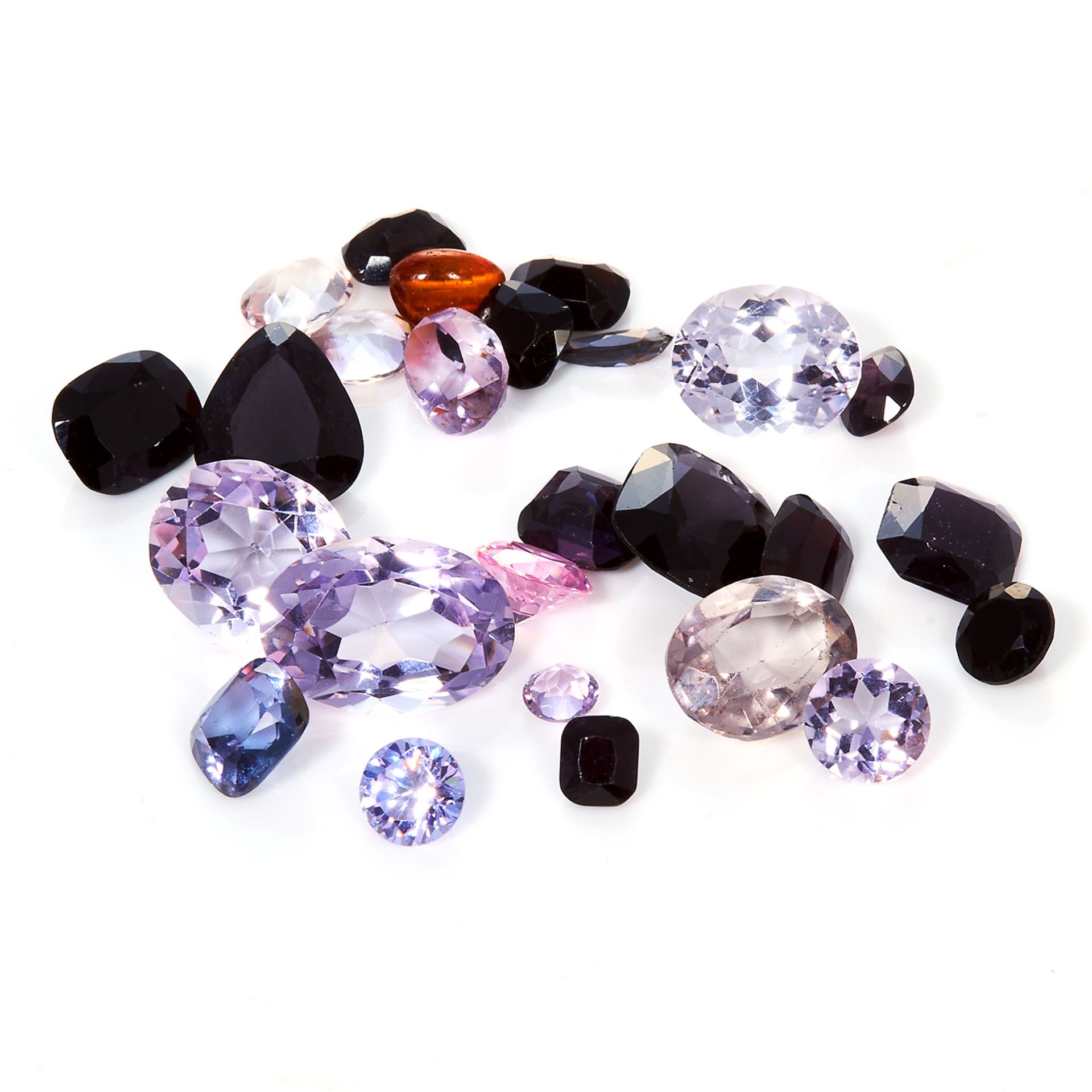 A 50.25 CARAT PARCEL OF MIXED GEMSTONES to include amethysts, amber, etc.