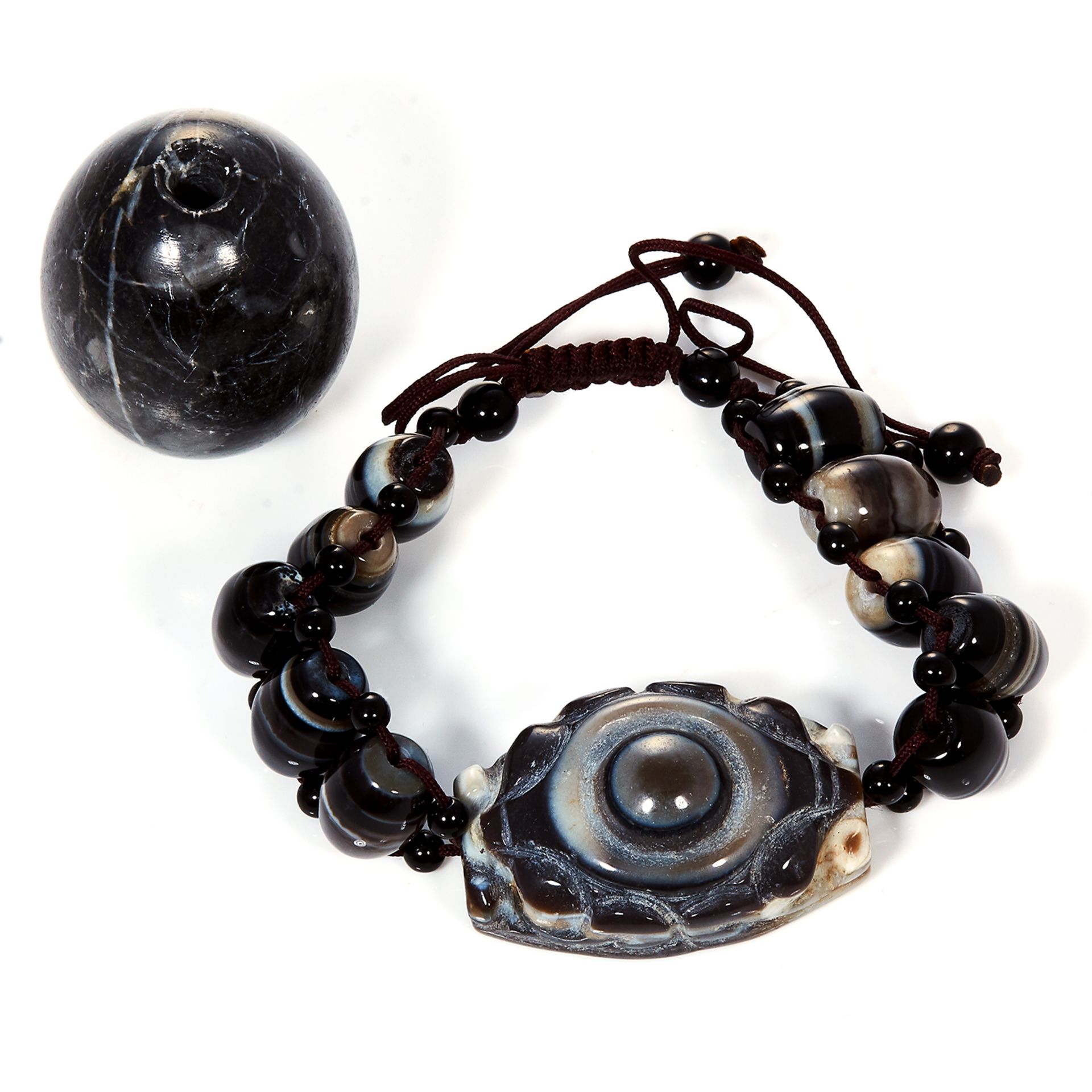 A BANDED AGATE BEAD BRACELET together with a polished hardstone egg bead, 113g.