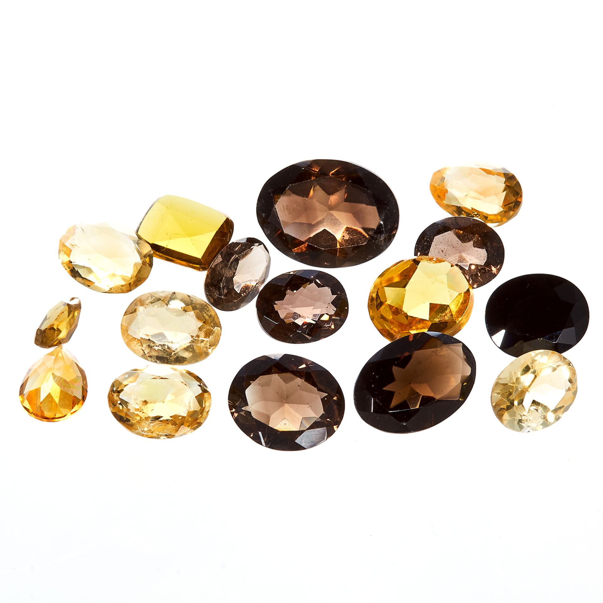 A MIXED 49.0 CARAT PARCEL OF CITRINES AND SMOKY QUARTZ variously sized, oval and step cut, sixteen