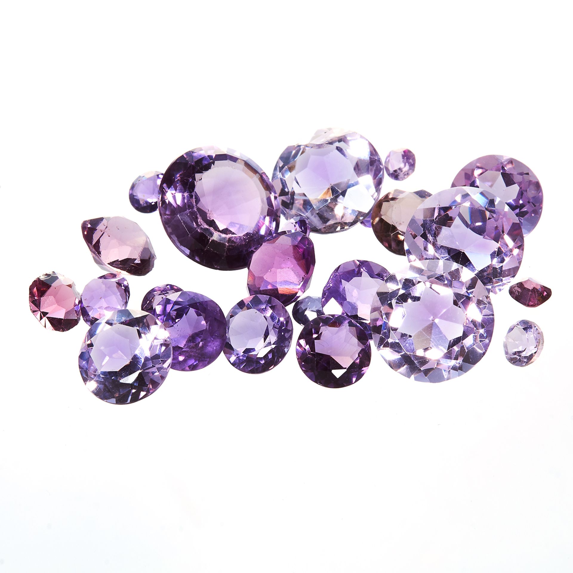 A 101.50 CARAT PARCEL OF AMETHYSTS variously sized up to 15.80 carats, oval and round faceted,