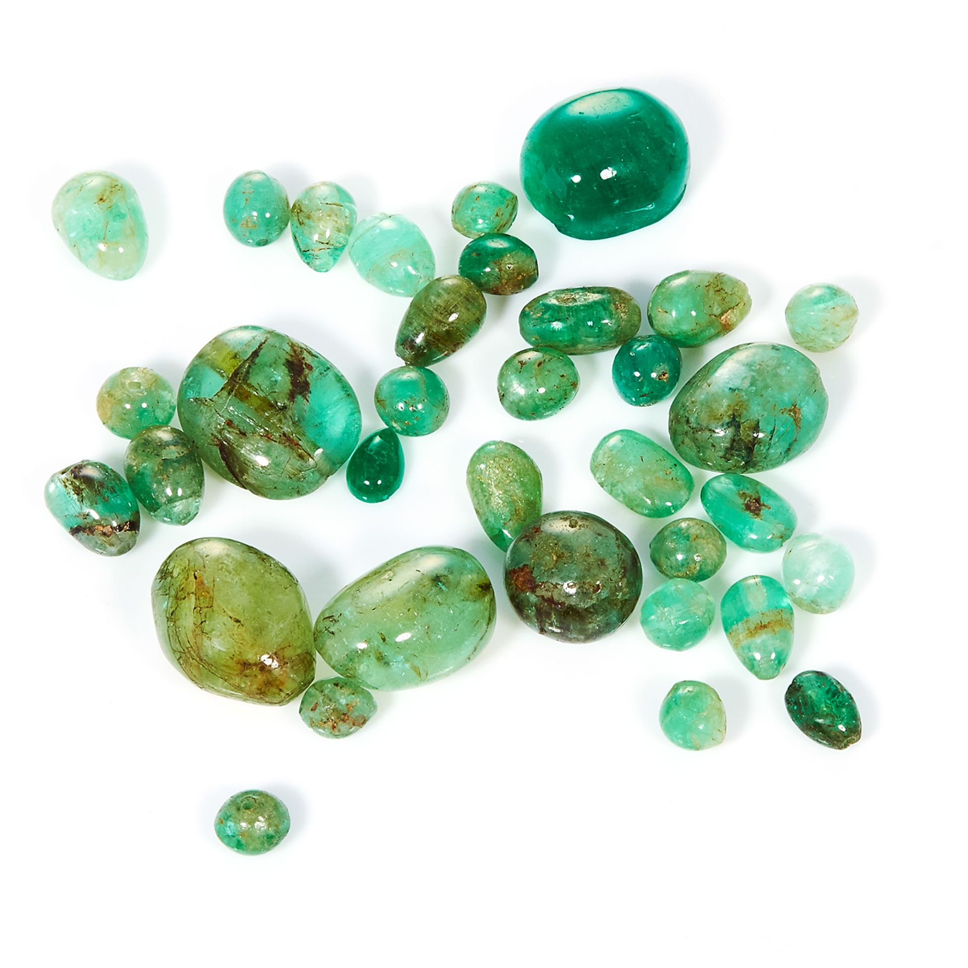 A 142.60 CARAT PARCEL OF EMERALD AND GREEN BERYL variously sized, cabochons, beads, etc.