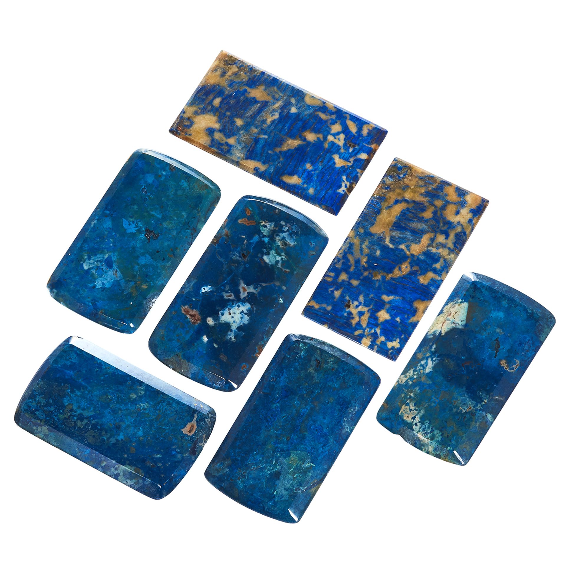 SEVEN POLISHED LAPIS LAZULI OR OTHER BLUE HARDSTONE SLABS TOTALLING 943.50 CARATS