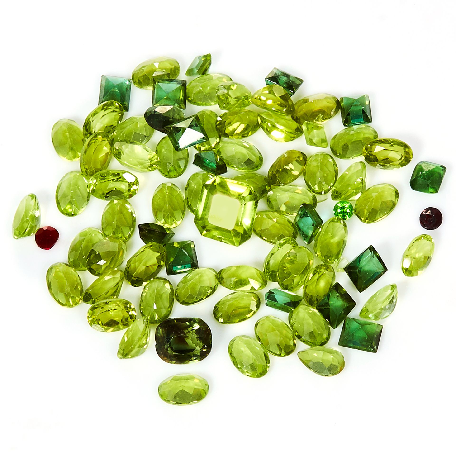A 38.90 CARAT PARCEL OF PERIDOT various sizes and shapes