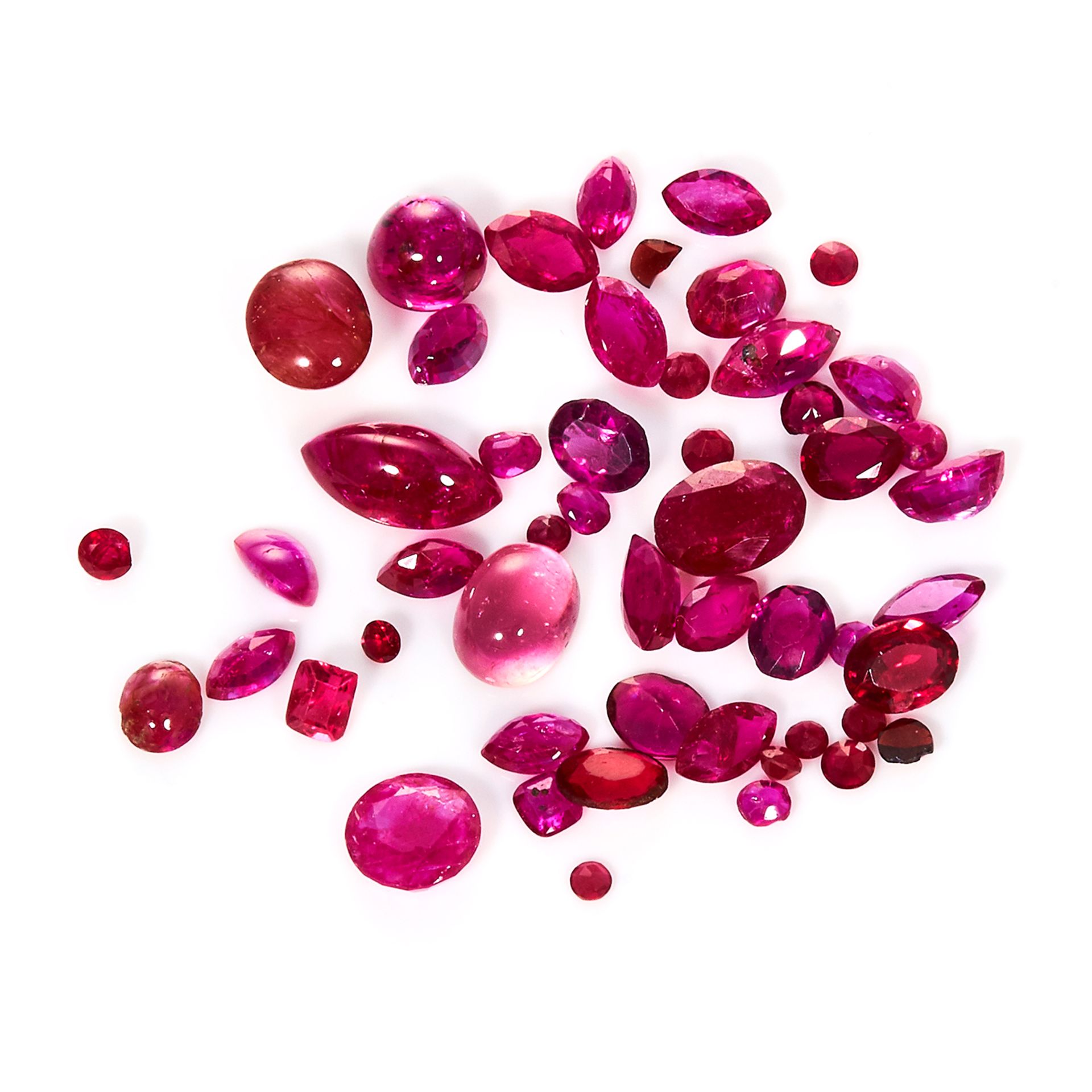 A 25.40 CARAT PARCEL OF RUBIES various sizes and shapes, including a selection of stones over 1ct.