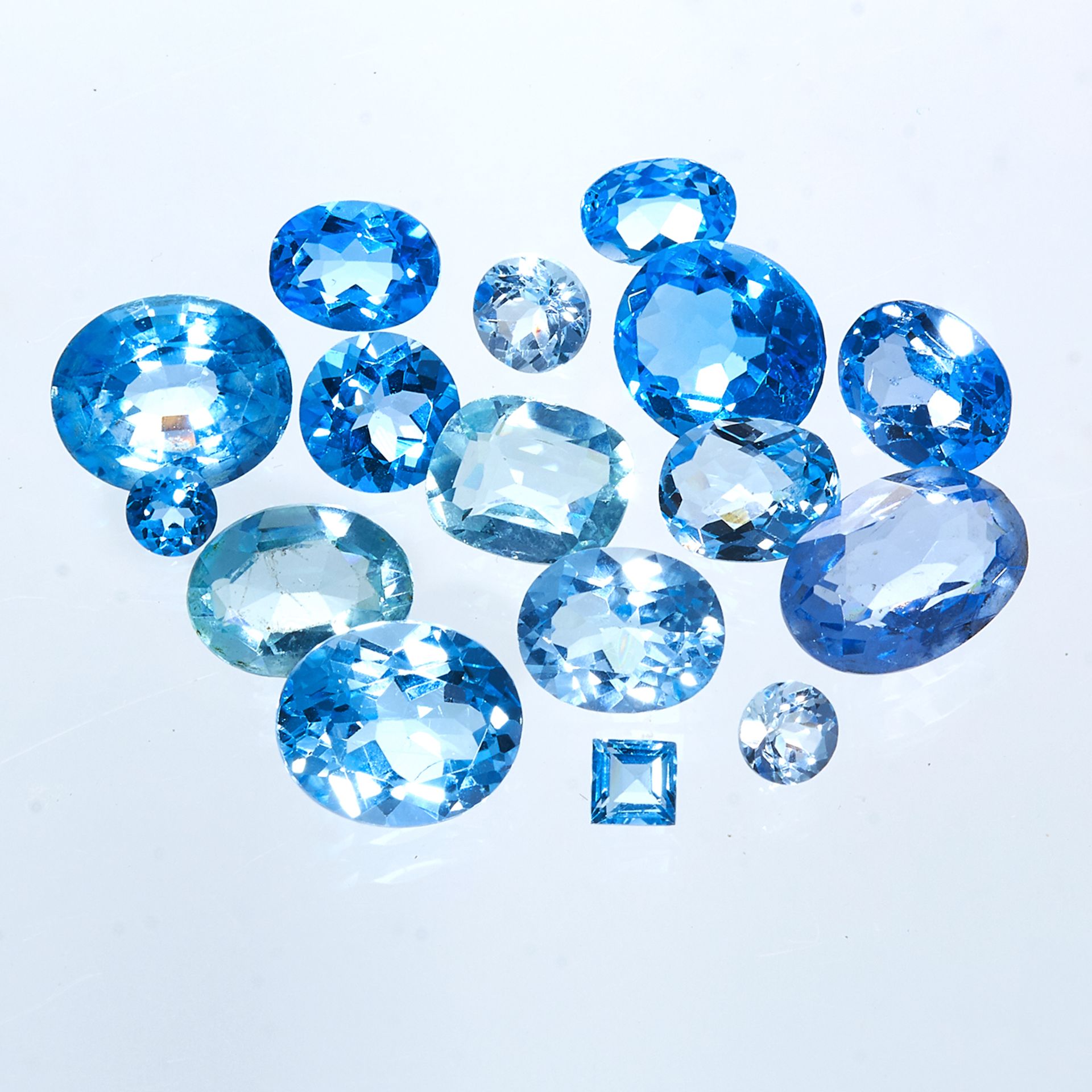 A 47.50 CARAT PARCEL OF BLUE TOPAZ variously sized, mostly round and oval.